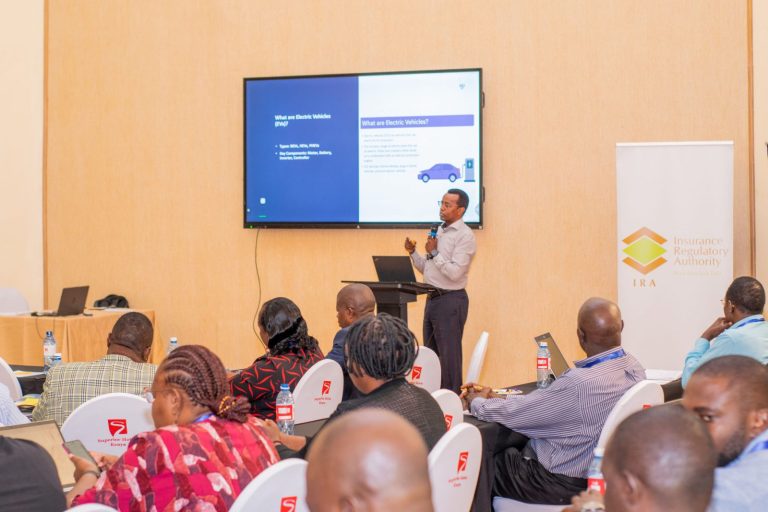 Speaker presenting slides to IARS delegates