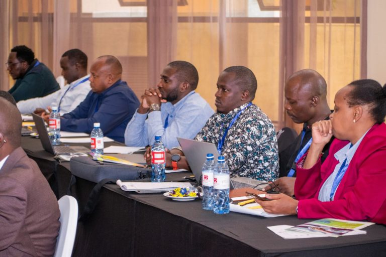 Delegates taking notes during an IARS seminar
