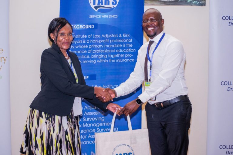 IARS member presenting a token of appreciation