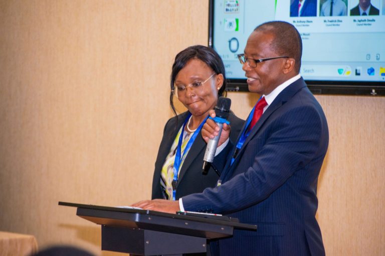 Speakers at the podium during an IARS conference