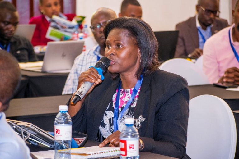Delegate speaking from the floor at an IARS conference
